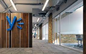 The Corridor In The Yammer London Office Is Made Chic With Milliken S Comfortable Concrete Floor Covering De Workplace Design Concrete Floors Design Solutions