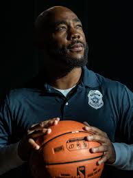 Pike state basketball champ, now IMPD officer, plays to fight the horror