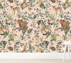 Decorate a woodsy nursery with motifs featuring furry friends and mother nature's beauty. Wallpaperie Woodland Storybook Wallpaper Pottery Barn Kids