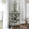 Stocker l'arbre à l'extérieur jusqu'à noël, dans un endroit frais et humide. 1