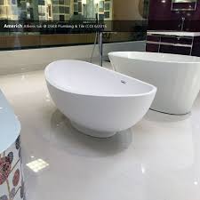The lovely mini chandelier, vessel bowl sinks, new free standing tub and polished brass fixtures have made our new bathroom look like the bathroom of our dreams. Americh Athens Tub Dskb Plumbing Tile Co 6 2015 Showroom Display Tub Kitchen And Bath
