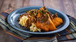 This pork schnitzel with mushroom gravy is a delicious meal that's worthy of a special occasion. Pork Schnitzel With Mushroom Sauce And Spatzle My Mickey Vacation Travel