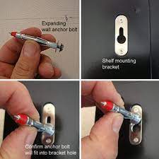 Using Wall Anchors To Hang A Decorative Shelf Wall Anchors Shelves Wall Hanging Shelves