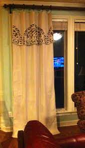 This is one of those projects that i have had in the works. Drop Cloth Curtain Stenciled With Rubber Door Mat And Brown Spray Paint No Sew Love It Diy Curtains Inside Decor Home