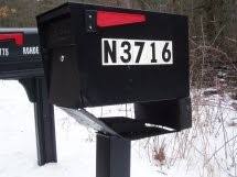 Remember to take the mail out before you play with it. Mail Boss Survives Snow Plow Impact