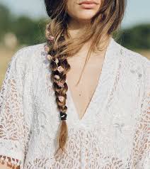 Begin to braid the hair from the backmost point of the head until you reach the ponytail point and then secure the braid along with the other free hair together in a bun. 20 Uniquely Beautiful Braided Hairstyles For Girls