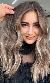 Because no matter your hair color—blonde, brown, red, or gray—you're going to look older if it lacks dimension. Best Hair Colours To Look Younger Brown With Blonde Highlights