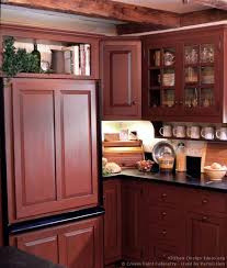 A Rustic Country Kitchen In The Early American Style Country Kitchen Red Kitchen Cabinets Rustic Country Kitchens