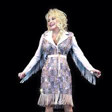 With tennessee homesick blues runnin' through my. Dolly Parton On Her Fashion Choices More Is More
