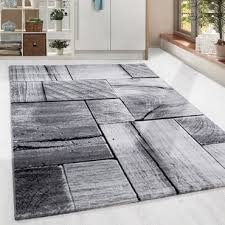 Kurzflor teppiche sind die allrounder unter den teppichen und können in fast jedem wohnbereich eingesetzt werden. Design Kurzflor Teppich Holzbalken Look Wohnzimmer Grau Schwarz Meliert Ceres Webshop