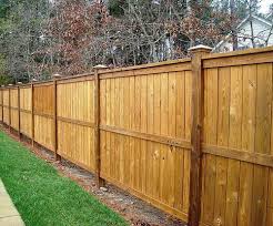 Timber fencing is known for its durability. Pin By Amy Rodriguez On Fences And Gates House Fence Design Wooden Fence Fence Design