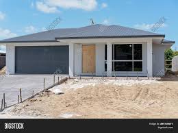 Grey house with dollar symbol icon isolated on white background. Suburban House Being Image Photo Free Trial Bigstock