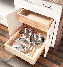 Spice racks keep small jars and bottles in one place and easy to access. Pull Out Cabinet Drawers Shelves Space Saving Ideas Wellborn Cabinet Blog