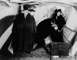 A young man named francis sits in a courtyard with another man, seemingly hypnotized by the sight of a catatonic woman named jane walking past them. The Cabinet Of Dr Caligari 1920 Imdb