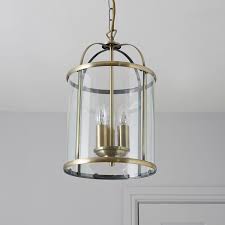 The clear optic glass shade has a slight ribbed effect and has a decorative… moorgate ceiling pendant lantern light in cast polished brass/gold. Meira Antique Brass Effect 3 Lamp Pendant Ceiling Light Departments Diy At B Q Ceiling Pendant Lights Ceiling Lights Ceiling Lights Diy