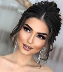 Who can recommend a makeup artist for October 5th?