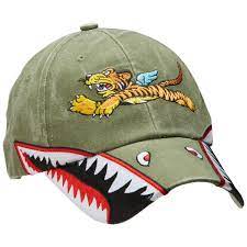Our Flying Tigers Apparel Pays Homage To The 1st American Volunteer Group A Fighter Group That Consisted Of Curtiss P 40 Aircraft Cap Collection Cap Nose Art