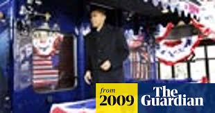 Barack Obama boards train to Washington