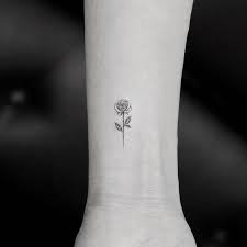 These three little birds on the lower abdomen may illustrate one of the mentioned ideas. Tiny Rose Tattoos That Will Be Blooming All Year Long
