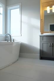 Daltile Fabrique Tile Maxx Jazz Tub Dark Gray Vanity And Light Gray Walls Benjamin Moore Balbo With Images Light Grey Bathrooms Grey Bathroom Floor Dark Gray Bathroom