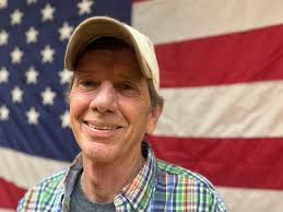 RED BANK: HOLIDAY, "HOMETOWN HERO" EASES INTO RETIREMENT