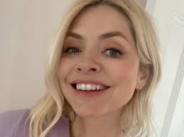 Holly Willoughby films from princess bed inside private family home