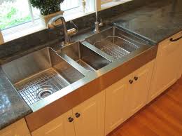 A Triple Bowl Stainless Steel Kitchen Sink In A Farmhouse Style Kitchen Sink Remodel Large Kitchen Sinks Traditional Kitchen Sinks
