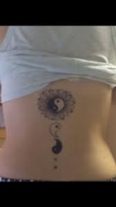 Ying Yang Spine Back Tattoo There Is Bad In Life And Good There Is A Little Bit Of Good In Every Bad Vice Ve Daisy Tattoo Tattoos And Piercings Spine Tattoos