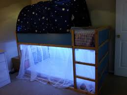 Kura Bed With A Trofast Unit For Stairs Added Some Curtains And Led Christmas Lights And My Daughter Has A Readin Ikea Kura Bed Bed Tent Bunk Beds With Stairs