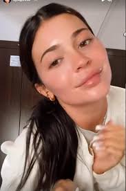 Kylie Jenner poses in a skimpy halter top in throwback beach photos from  recent vacation