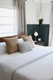 A bed skirt, also called a dust ruffle, is a traditional bed dressing that covers the box spring and extends nearly to the floor. A Modern Moody Bedroom Reveal Chris Loves Julia