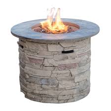 Its exterior is made of a durable and lightweight envirostone material, which brings a natural vibe to your backyard while discreetly housing its propane tank. Noble House Ophelia 32 In X 24 In Circular Mgo Propane Fire Pit 7549 The Home Depot