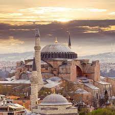 A tall slender tower, typically part of a mosque, with a balcony from which a muezzin calls muslims to prayer. Tickets Hagia Sophia Istanbul Tiqets Com