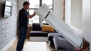 Moveable Folding And Expandable Furnishings Turn The Lounge Of This 33 Square Metre New York Apartmen Small Apartment Design Apartment Design Small Apartments