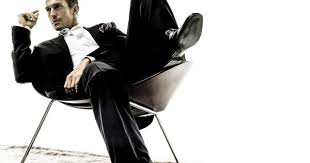 stylish man sitting in chair fashion model suit chair cool man studio white matthewbarnesph sitting pose reference sitting poses pose reference photo
