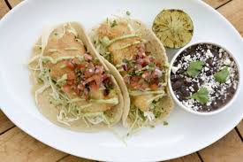 Mix together the garlic powder, cumin and chilli powder then spread evenly onto both sides of the fish and season generously with salt and pepper. Best Specials For National Taco Day 2018 In Los Angeles Cbs Los Angeles