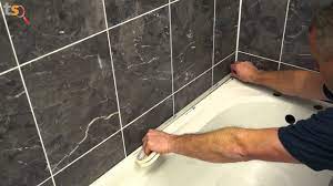 Looking for a tiler to regrout and reseal a 1.5m x 2.2m bathroom. Tommy S Trade Secrets How To Silicone A Bath Youtube