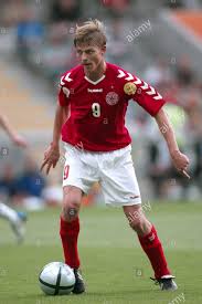 He is a member of group denmark national football team (assistant). Jon Dahl Tomasson Denmark 2004 Jon Dahl Tomasson World Football Football Shirts