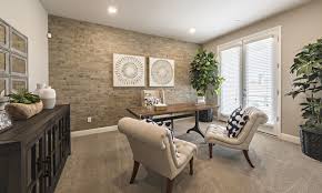 A flex room is an excellent spot for a bar! Brick Accent Makes A Bold Statement For A Front Flex Room Design Living Room Remodel Bonus Room Design Home