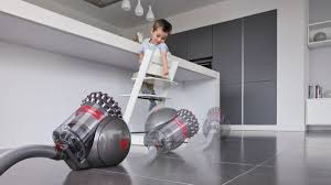 Rinsing under the water supply then gently squeezing the water out of the filter. Dyson Big Ball Animal 2 Review King Of The Dyson Cylinder Vacuum Cleaners T3