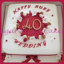Use bouquets of red roses as the centerpieces on the food tables. 40th Wedding Anniversary Cake Wedding Anniversary Cakes 40th Wedding Anniversary Cake Anniversary Cake