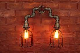 We clean and seal our iron pipe fixtures to have a finished patena without paint. Amazon Com Wall Sconce Industrial Lighting W Cages Black Pipe Steampunk Bathroom Vanity Light Fixture Intage Edison Light Bulbs Loft Art Pipe Light Handmade