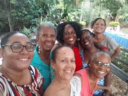 Say it loud: #SISTERHOOD!! The bright and beautiful smiles of WMW Jamaica  members at our in-person meeting