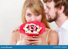 Couple Sharing Candy Stock Photos