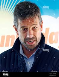 Guy Vanderhaegen, Origis Energy's CEO and president, speaks about the  ambitious energy joint venture with Cooperative Energy, in establishing a  52-megawatt solar project in Lamar County, during an official unveiling  near Sumrall,