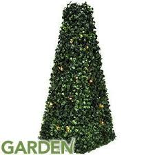 Shop for lighted topiary trees online at target. Artificial Pyramid Cone Tree With Solar Powered Led Lights Topiary Bush Solar Light Tree Garden Lighting Buy Online In Qatar At Qatar Desertcart Com Productid 54889607
