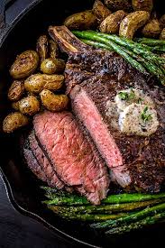 Pepper Crusted Cowboy Rib Eye Steak With Shiitake Mushroom Butter Recipe Easy Steak Recipes Beef Dishes Stuffed Peppers