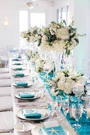 Add silver touches with hair pins and combs or wear an elegant silver statement necklace with your wedding dress. Turquoise Silver And White Wedding Reception Florida Keys Wedding Resort Wedding Photo Gallery D Asigner Events