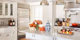 White kitchen ideas (photos) colonial remodel in white with light wood above is a remodeled kitchen done in mostly white with natural light wood floors and wood island surface. 40 Best White Kitchen Ideas Photos Of Modern White Kitchen Designs