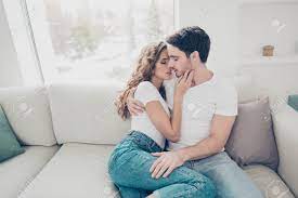 In one sentence either form is possible. Portrait Of Sexy Romantic Couple In Casual Denim Clothes Cuddling Stock Photo Picture And Royalty Free Image Image 105912096